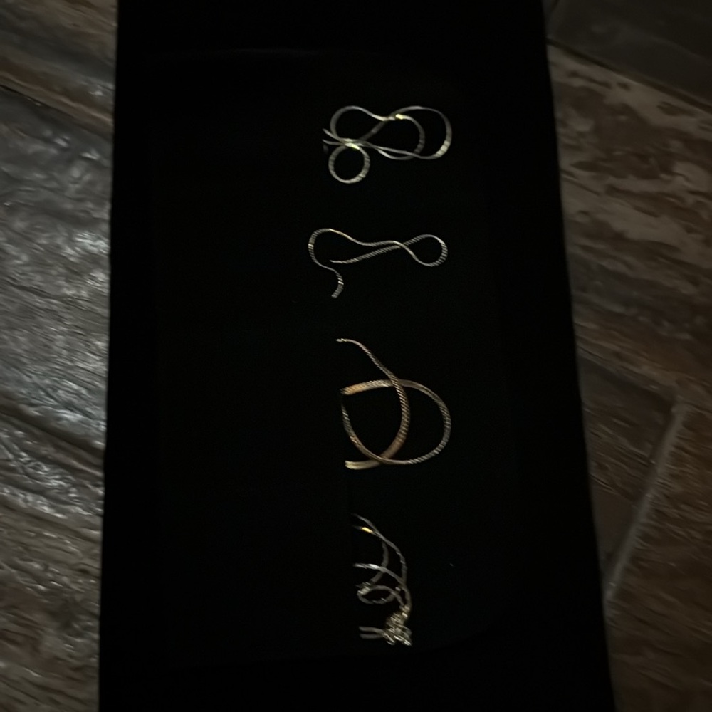 Joan Rivers necklaces. 4 chains. New in box.